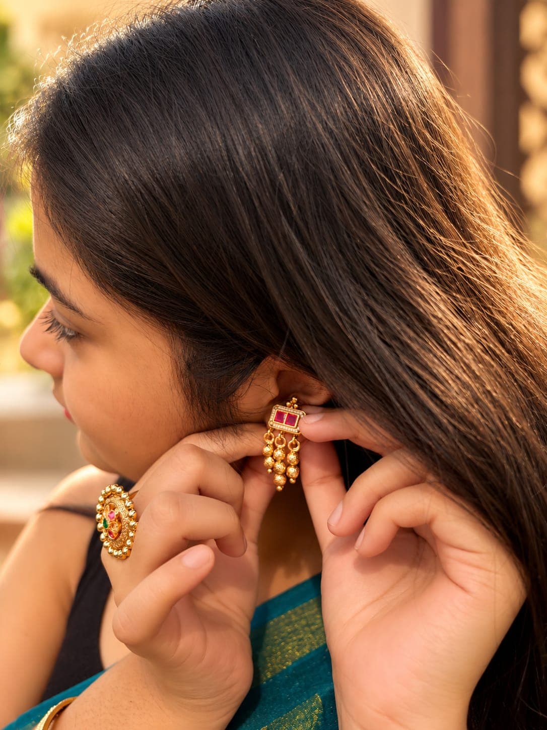 Woman wearing Narayani Creations jewellery
